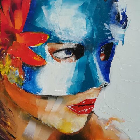 peinture à l'huile visage avec masque de carnaval bleu